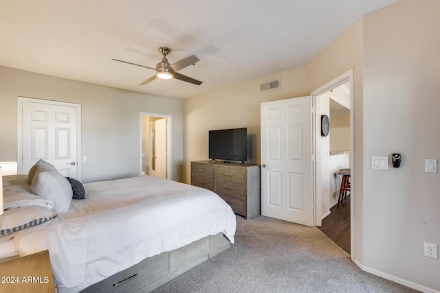 carpeted bedroom featuring ceiling fan