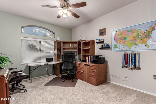 office area with light colored carpet and ceiling fan