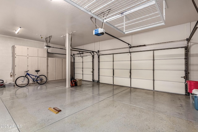 garage featuring a garage door opener