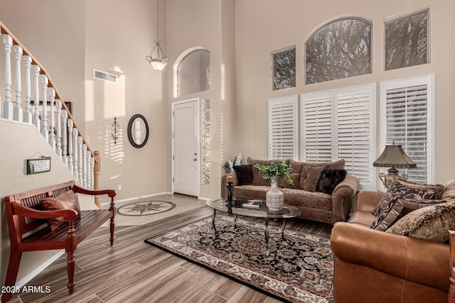 living room with a high ceiling