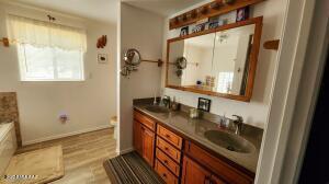 bathroom featuring a bathing tub and vanity