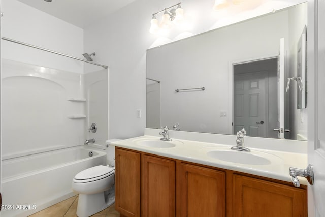 full bathroom featuring toilet, tile patterned flooring, vanity, and tub / shower combination