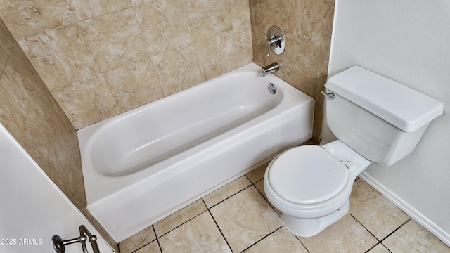 bathroom with  shower combination, tile patterned flooring, and toilet