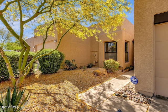 11775 E Becker Ln, Scottsdale, AZ 85259 - property entrance featuring stucco siding