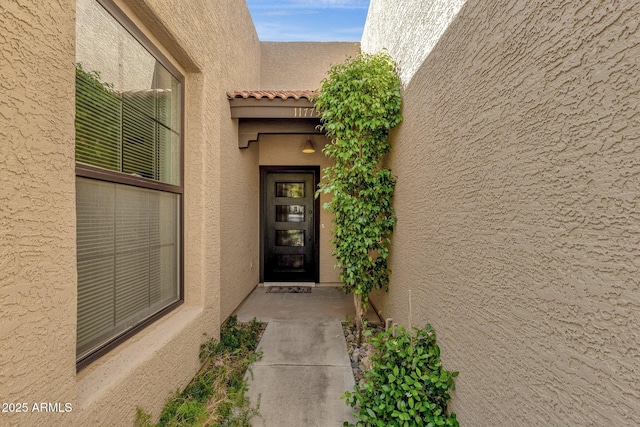 11775 E Becker Ln, Scottsdale, AZ 85259 - view of exterior entry with stucco siding