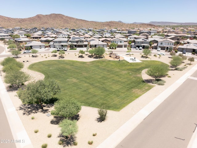 birds eye view of property featuring a mountain view