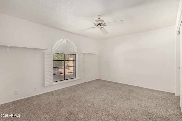 9857 W Tonto Ln, Peoria, AZ 85382 - empty room with carpet floors, a ceiling fan, and a textured ceiling