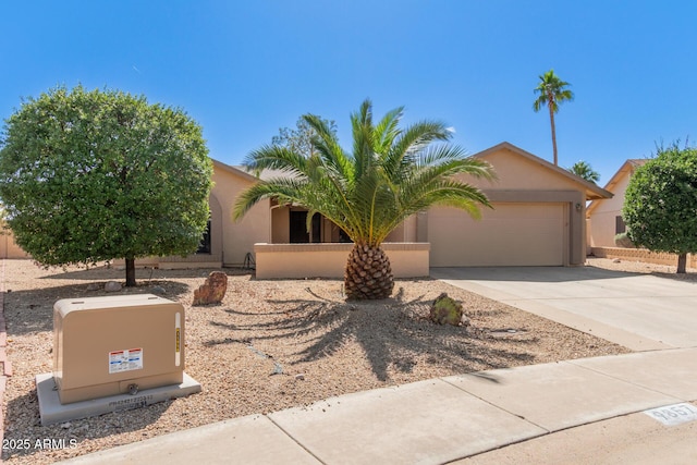 9857 W Tonto Ln, Peoria, AZ 85382 - obstructed view of property featuring stucco siding, an attached garage, and concrete driveway