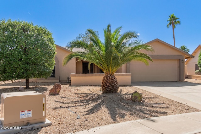 9857 W Tonto Ln, Peoria, AZ 85382 - view of front of house with an attached garage, stucco siding, and driveway