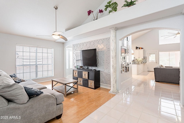 901 W Beck Ln, Phoenix, AZ 85023 - living room featuring a wealth of natural light, arched walkways, high vaulted ceiling, and ceiling fan