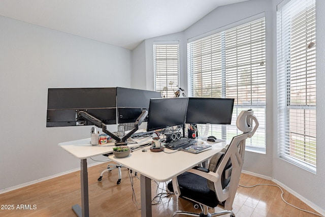 901 W Beck Ln, Phoenix, AZ 85023 - home office featuring baseboards, lofted ceiling, and wood finished floors