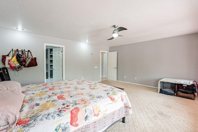 901 W Beck Ln, Phoenix, AZ 85023 - bedroom with a ceiling fan, baseboards, light colored carpet, and a textured ceiling