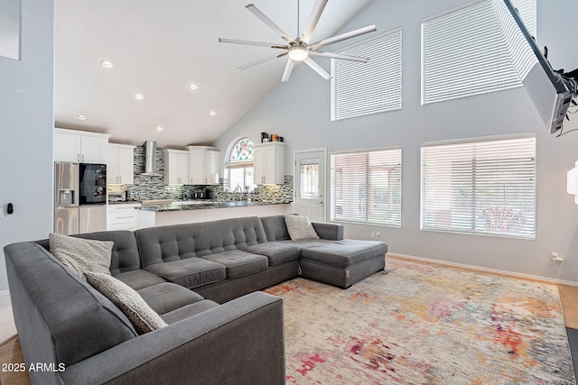 901 W Beck Ln, Phoenix, AZ 85023 - living room with a ceiling fan, high vaulted ceiling, baseboards, and recessed lighting