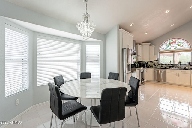 901 W Beck Ln, Phoenix, AZ 85023 - dining area featuring an inviting chandelier, light tile patterned floors, vaulted ceiling, and recessed lighting