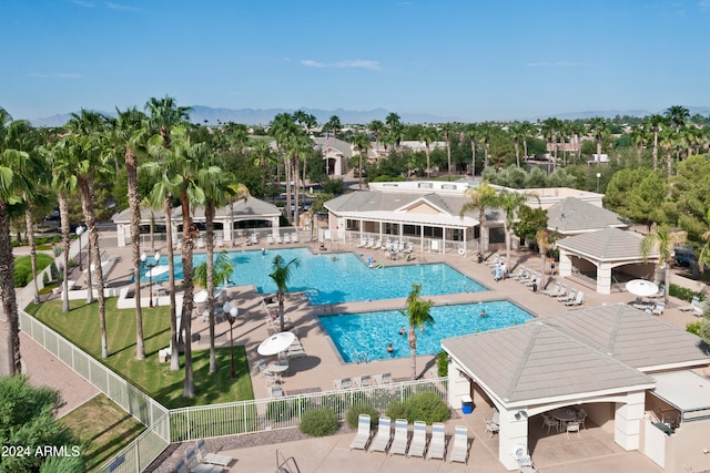 view of swimming pool featuring a patio and a gazebo