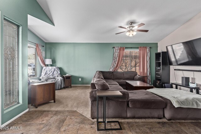 home office featuring lofted ceiling and carpet floors