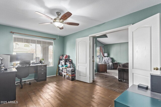 dining space with vaulted ceiling and ceiling fan