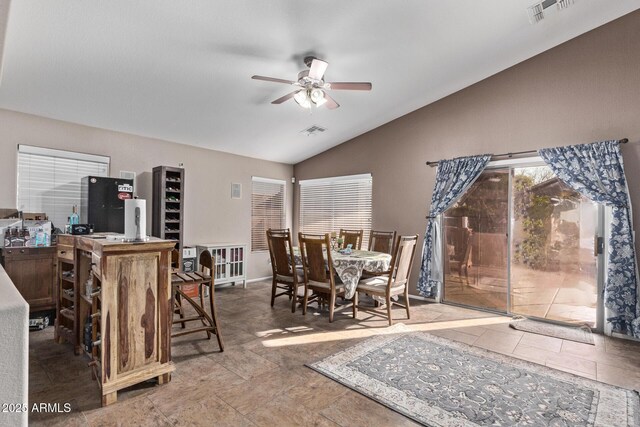 dining room featuring vaulted ceiling and ceiling fan