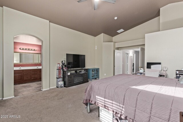 carpeted bedroom featuring ceiling fan and a closet