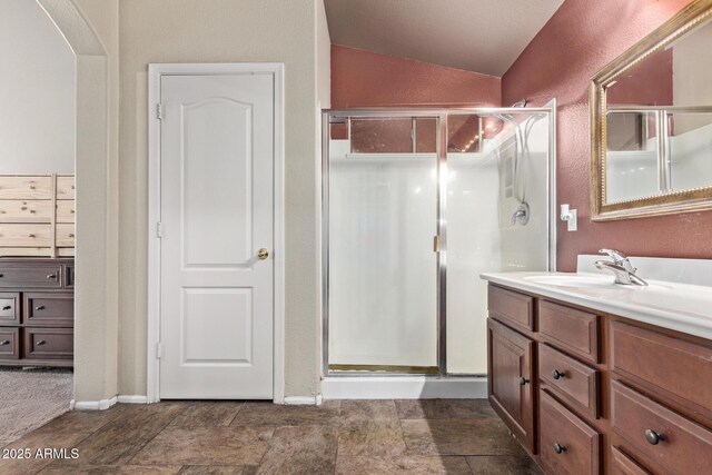 full bathroom with vanity, shower / tub combo with curtain, and toilet