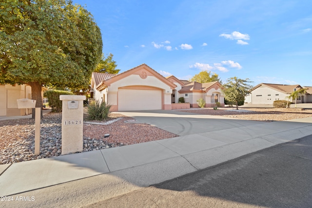 view of front of property with a garage