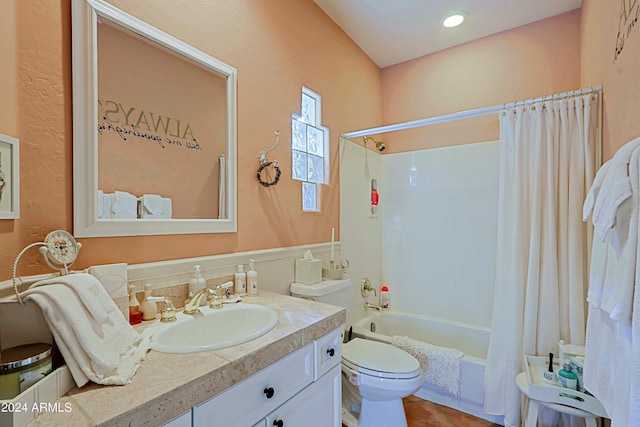 full bathroom featuring toilet, vanity, and shower / bathtub combination with curtain