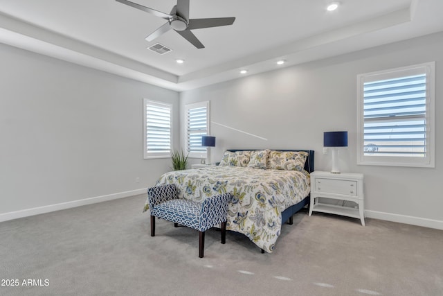 bedroom featuring baseboards, visible vents, and carpet flooring