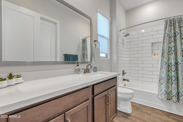 full bathroom featuring shower / bath combo, vanity, toilet, and wood finished floors