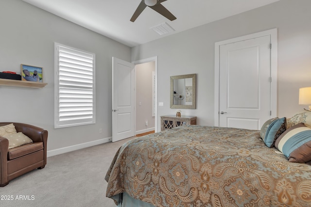 bedroom featuring a ceiling fan, baseboards, visible vents, and carpet flooring