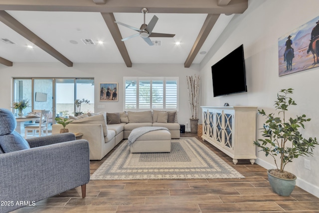 living area with wood tiled floor, visible vents, and baseboards