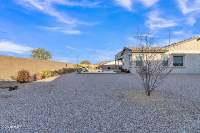 view of yard featuring fence