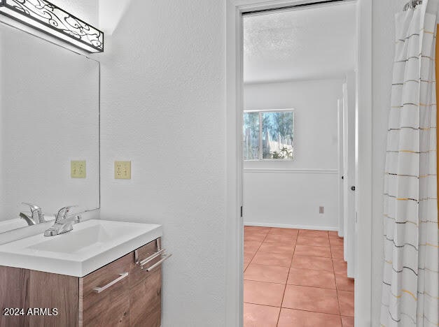 bathroom featuring vanity and tile patterned floors