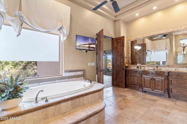 15956 E Tombstone Trl, Fountain Hills, AZ 85268 - full bath featuring a garden tub, vanity, a high ceiling, and a ceiling fan