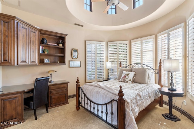 15956 E Tombstone Trl, Fountain Hills, AZ 85268 - bedroom with light carpet, baseboards, visible vents, and built in study area
