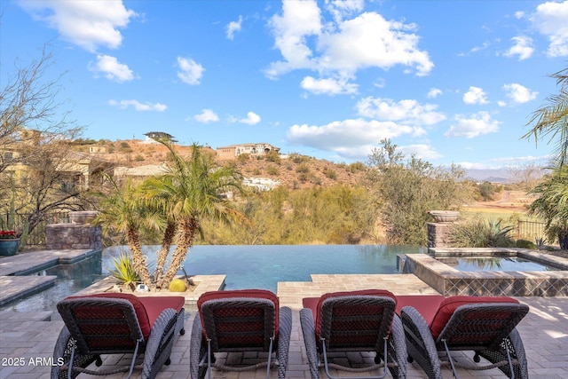 15956 E Tombstone Trl, Fountain Hills, AZ 85268 - view of pool with a patio area and an in ground hot tub