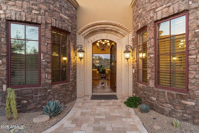 15956 E Tombstone Trl, Fountain Hills, AZ 85268 - view of exterior entry featuring stone siding