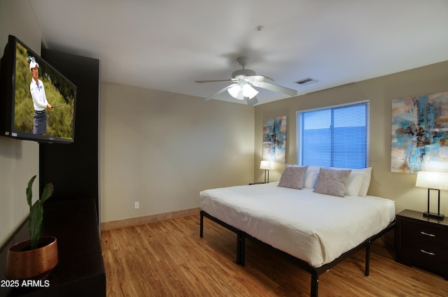 4008 N 85th St, Scottsdale, AZ 85251 - bedroom featuring light wood-type flooring, baseboards, and ceiling fan