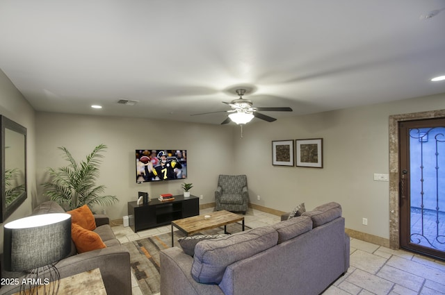 4008 N 85th St, Scottsdale, AZ 85251 - living area featuring baseboards, ceiling fan, recessed lighting, and stone tile floors