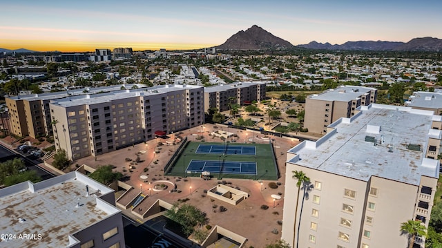 7930 E Camelback Rd Unit 506, Scottsdale, AZ 85251 - aerial view at dusk with a mountain view