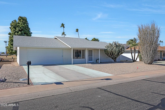 ranch-style house featuring a garage