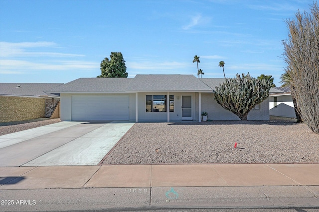 single story home featuring a garage