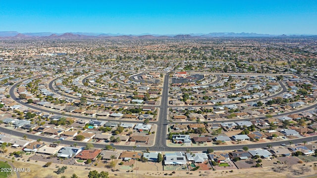 birds eye view of property featuring a mountain view