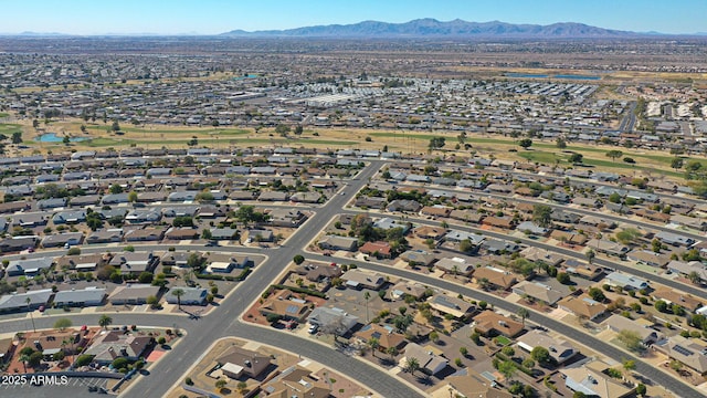 birds eye view of property featuring a mountain view