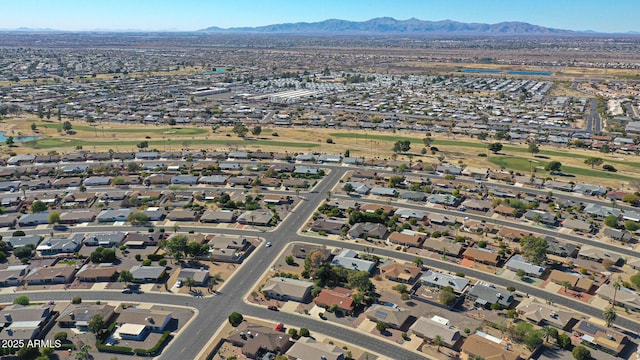 birds eye view of property with a mountain view