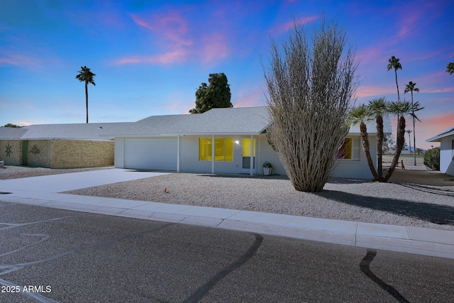 view of front of property with a garage