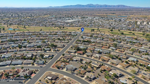 birds eye view of property featuring a mountain view