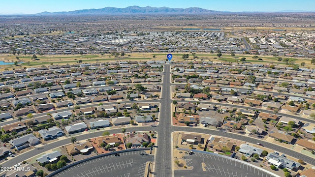 birds eye view of property with a mountain view