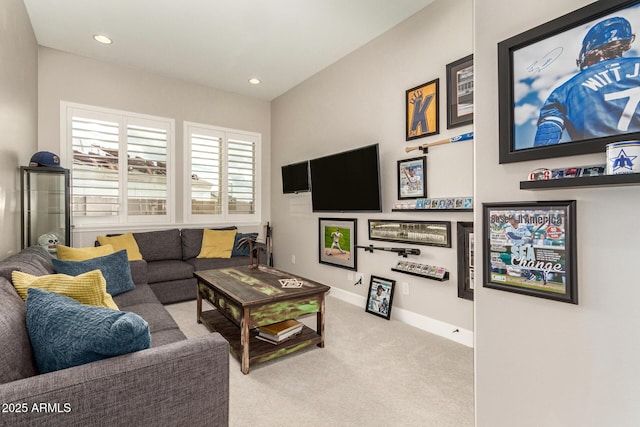 living room with carpet flooring, recessed lighting, and baseboards