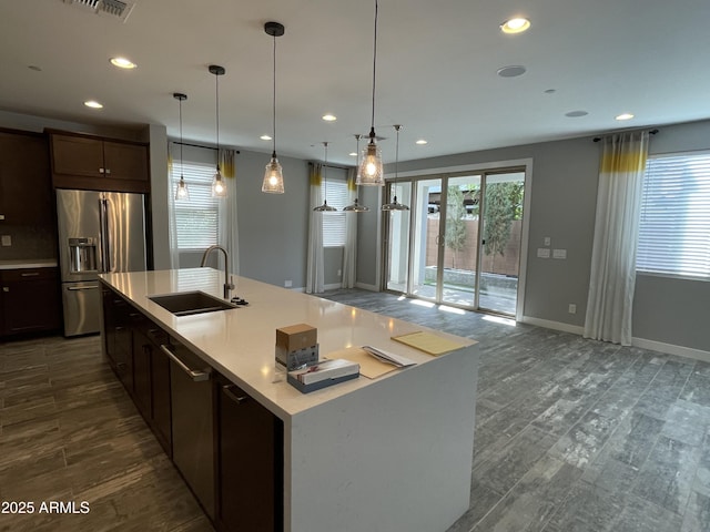 1840 S Follett Way, Gilbert, AZ 85295 - kitchen featuring high end refrigerator, a sink, dark wood-style flooring, light countertops, and recessed lighting