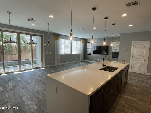 1840 S Follett Way, Gilbert, AZ 85295 - kitchen featuring a sink, dark wood-style floors, baseboards, recessed lighting, and decorative light fixtures
